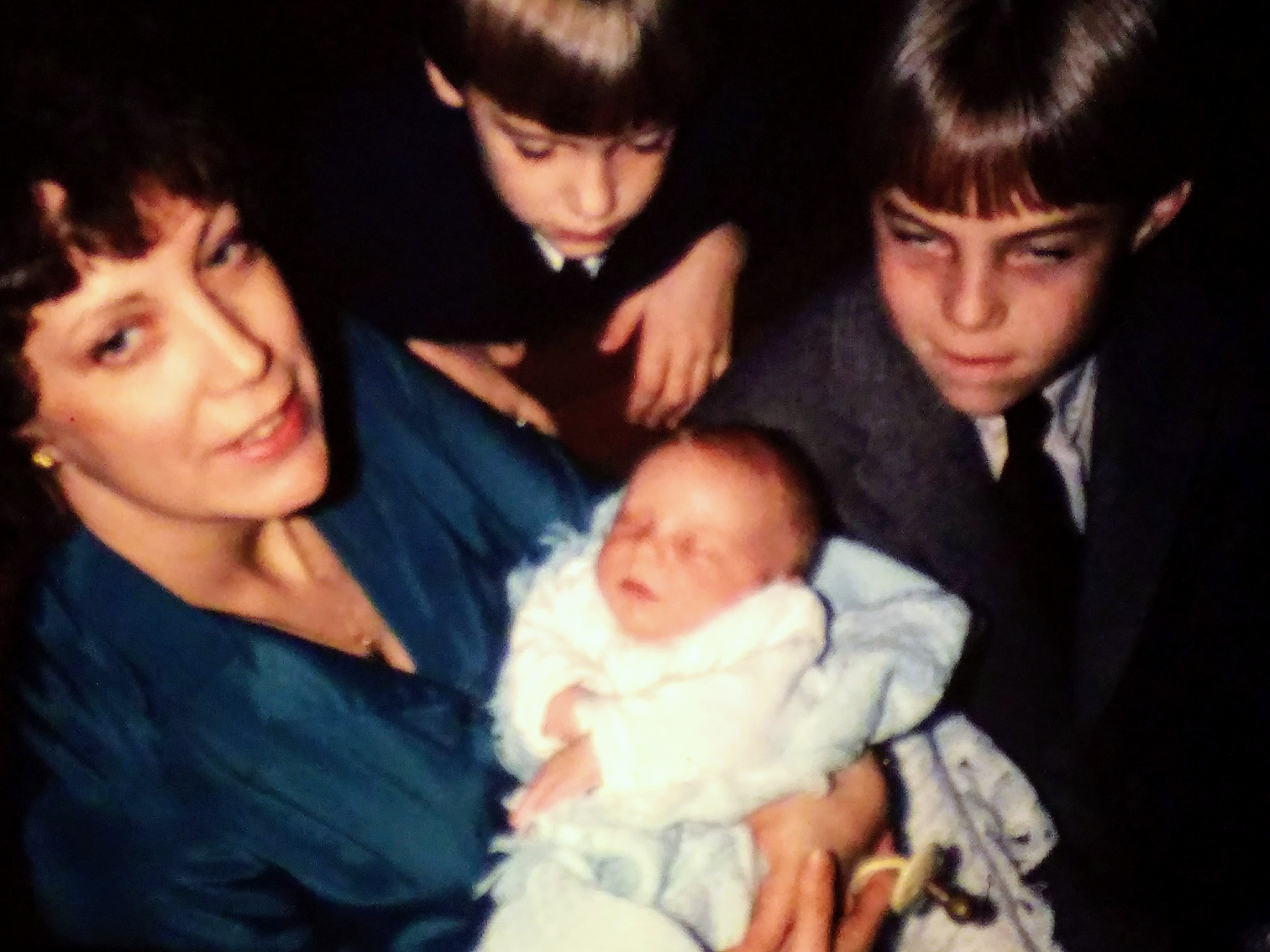 With Baby and Young Sons